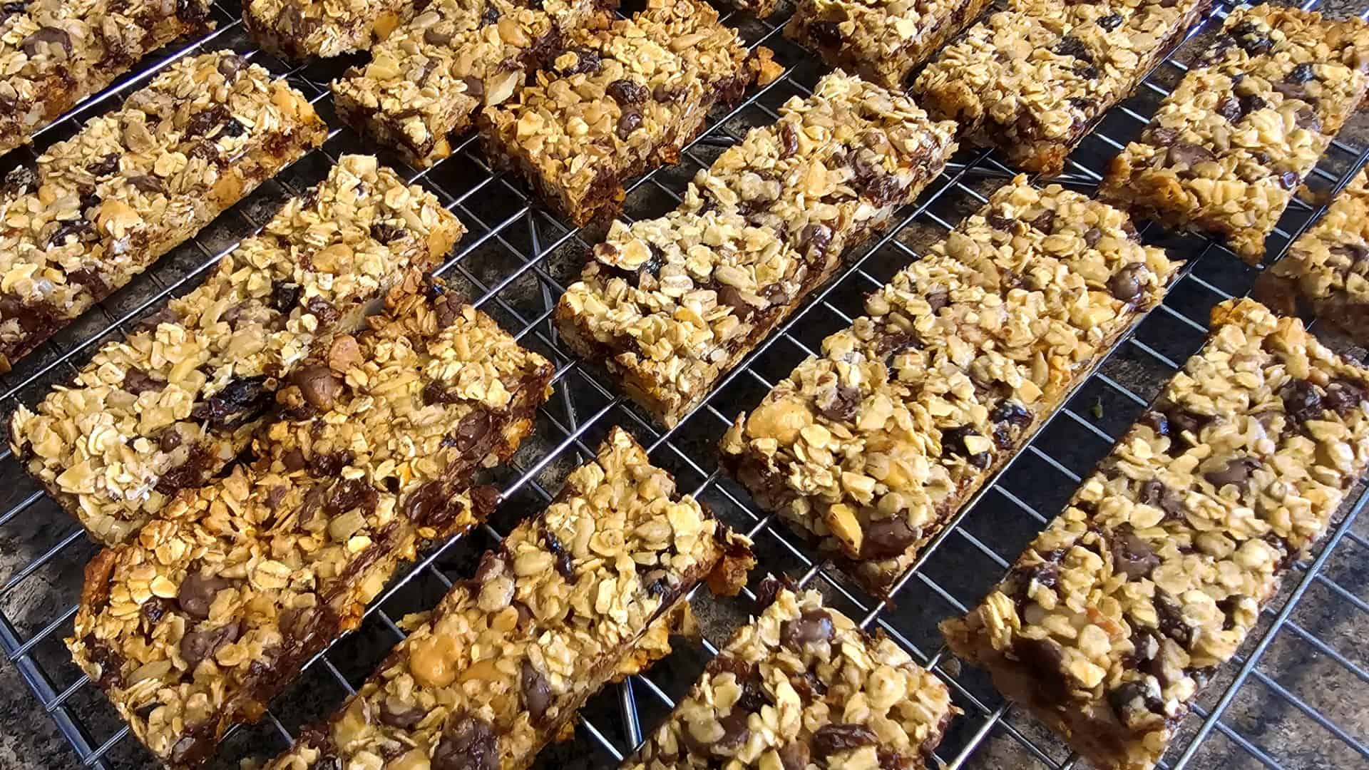 homemade granola bars on a wire rack cooling