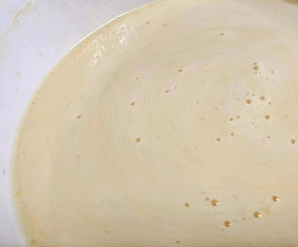 wet batter all mixed and ready to pour into a pie dish