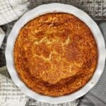 impossible pie sitting on a cooling rack