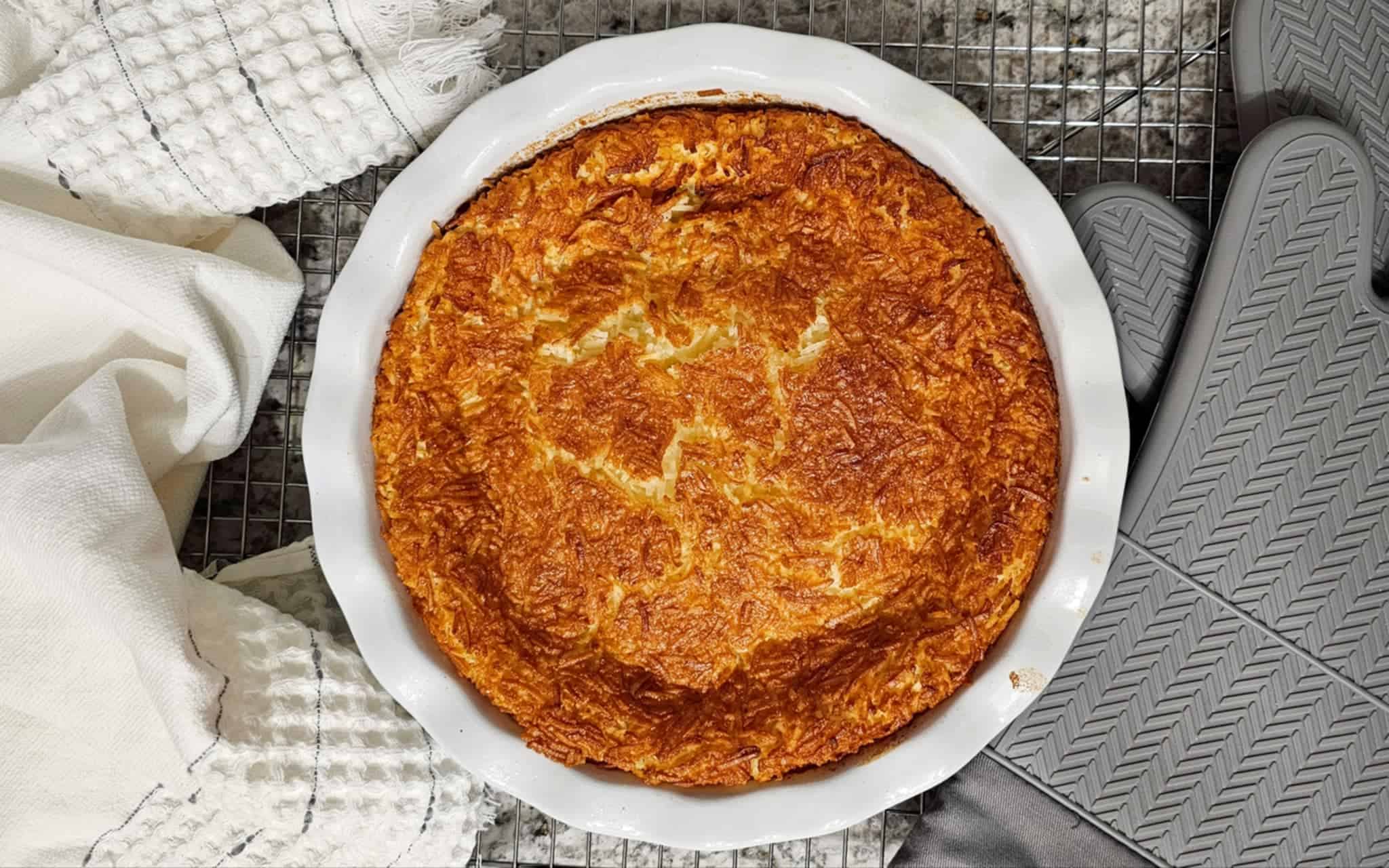 impossible pie sitting on a cooling rack