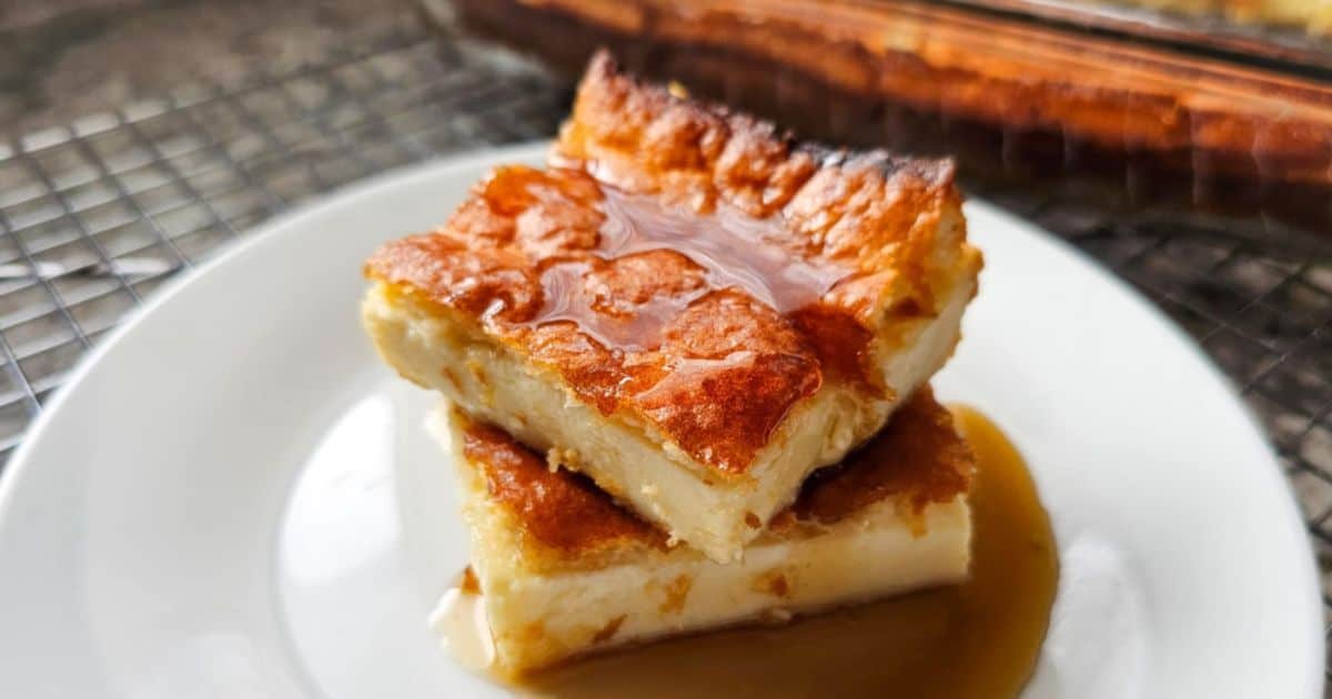 Pannukakku on a serving plate with pure maple syrup