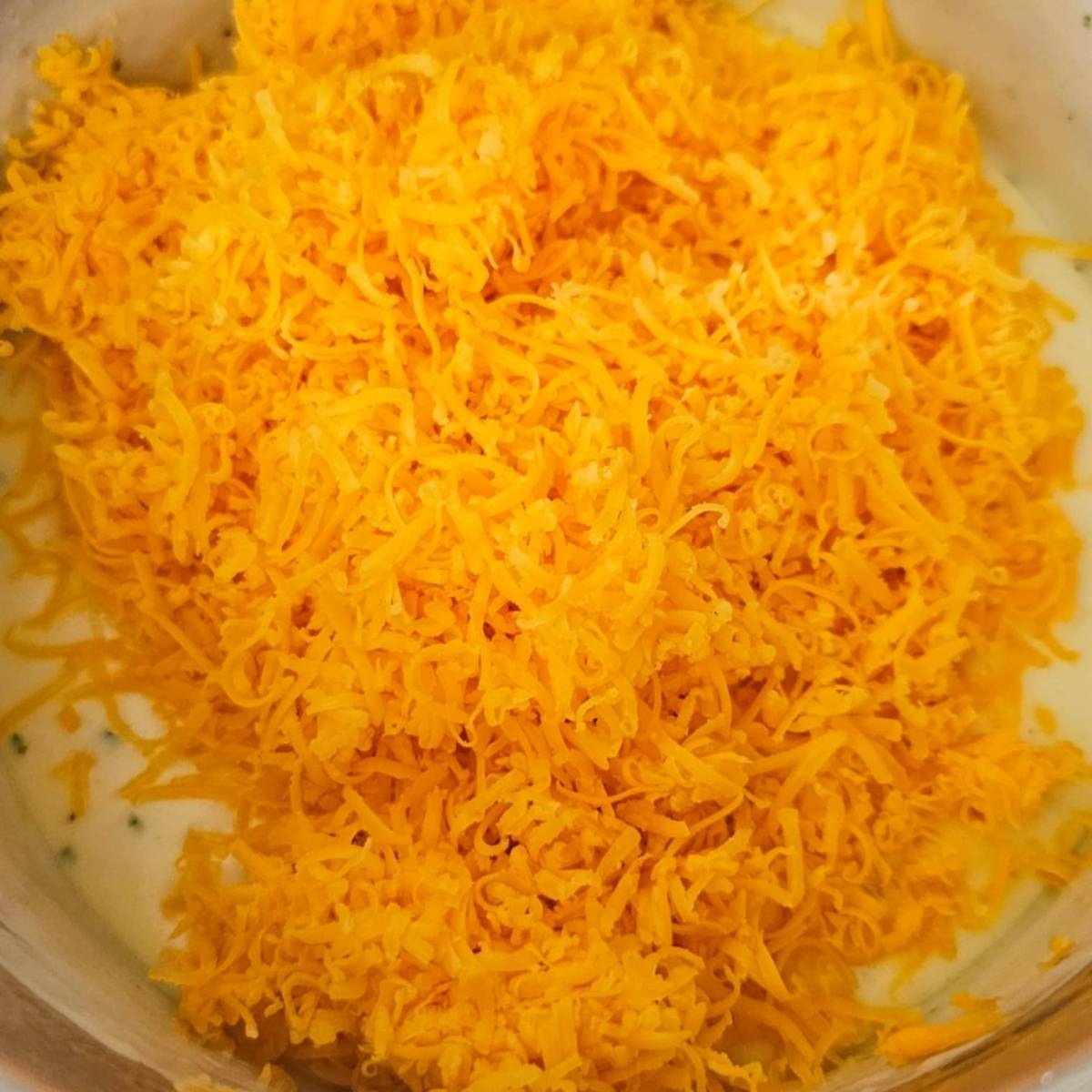 shredded cheddar cheese for the creamy macaroni and cheese