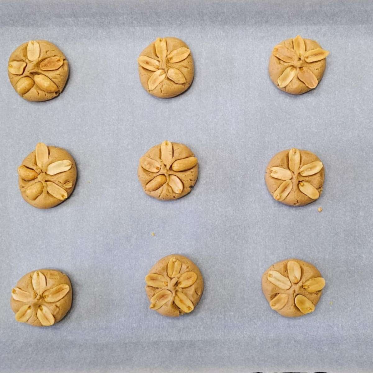 peanut butter cookies with a flower pattern on them