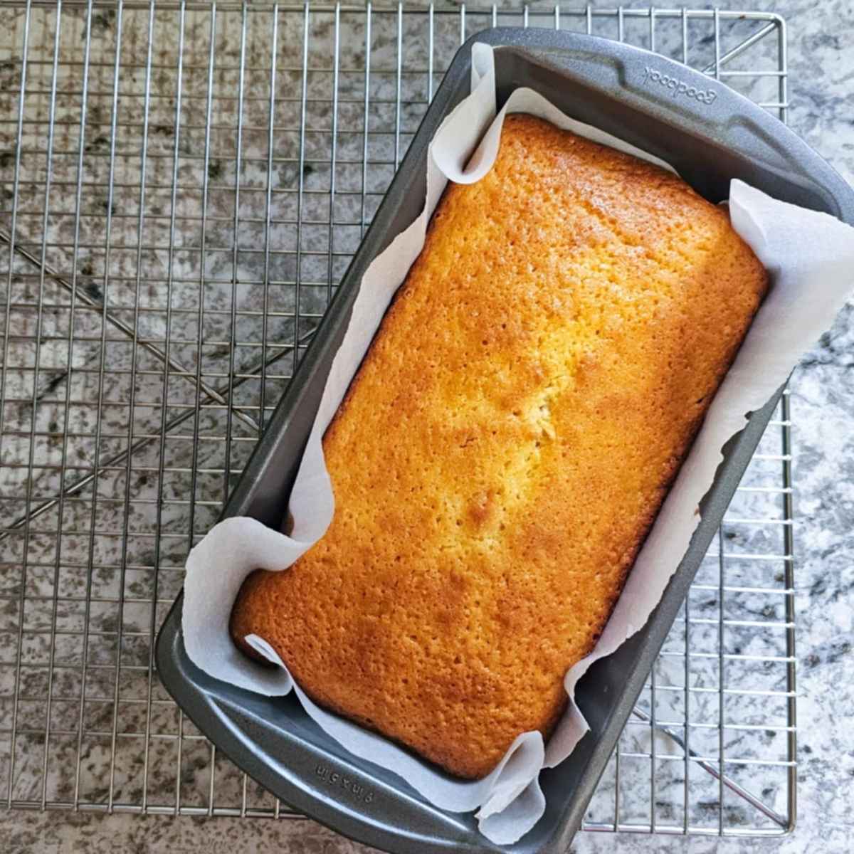 lemon loaf cooling on a wire rack