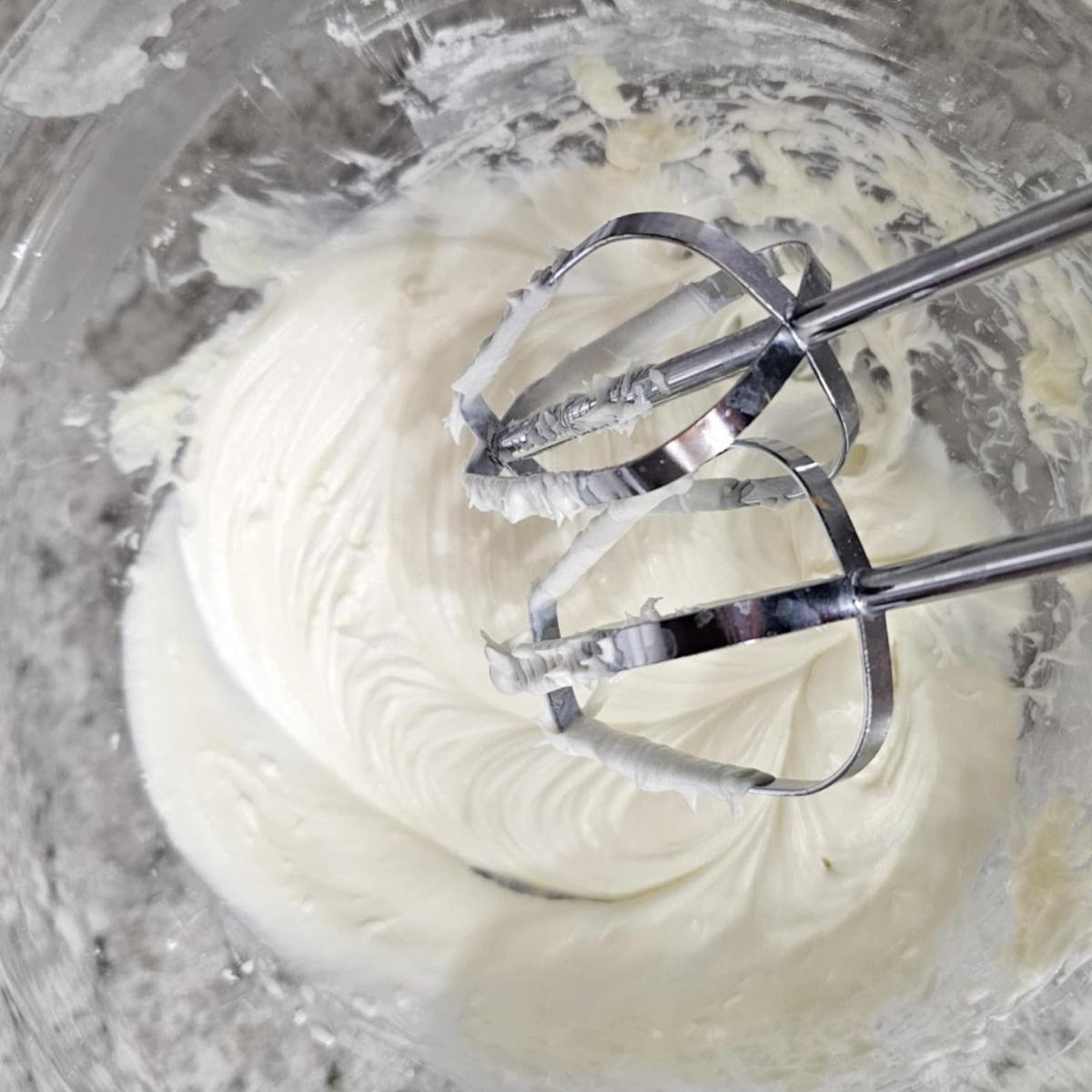 cream cheese whip cream in a bowl that was beat until smooth