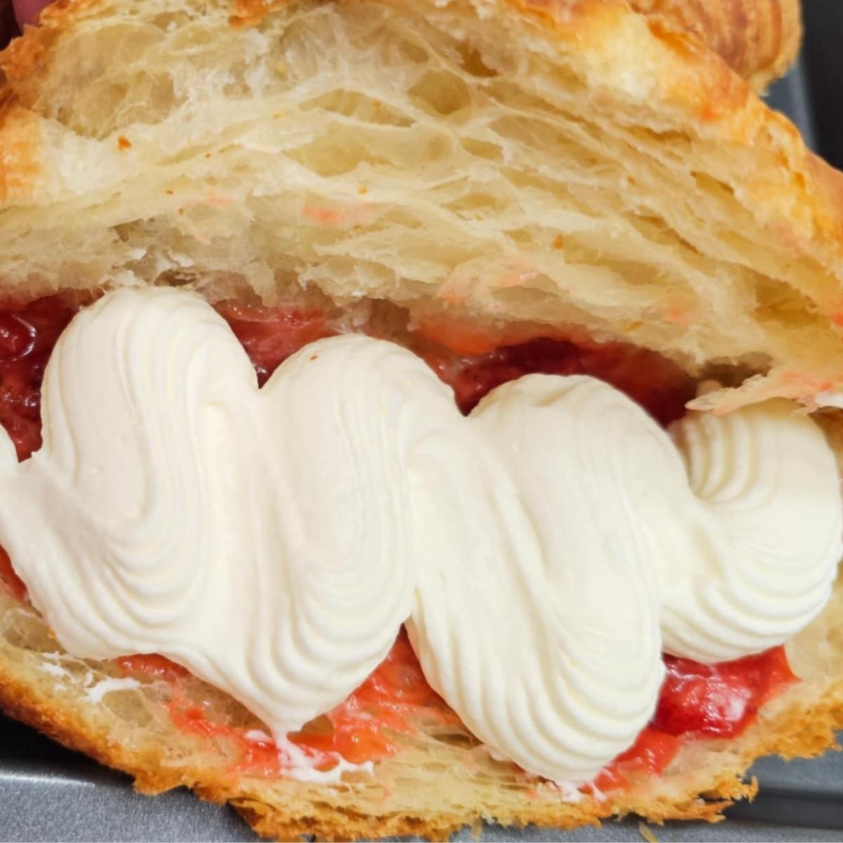strawberries and cream croissants with homemade whip cream in the center