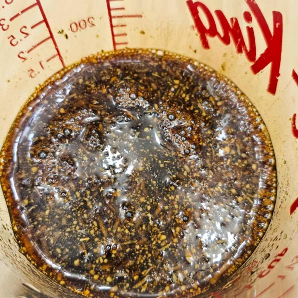 maple syrup, balsamic, Dijon and seasonings in a mason jar mixed together.