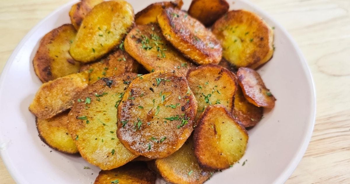 pan fried potatoes in a pink bowl