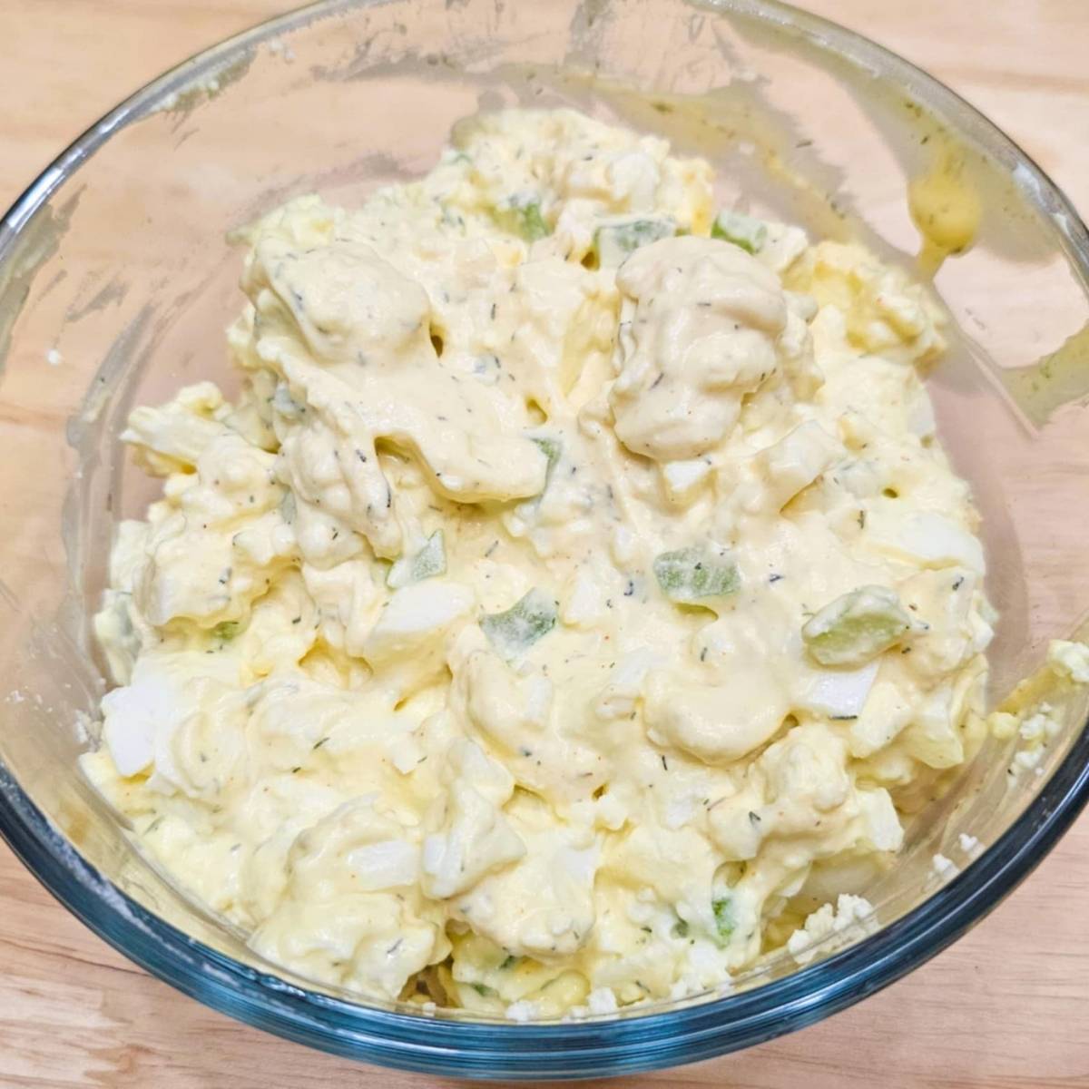 egg salad mixture in a clear glass bowl