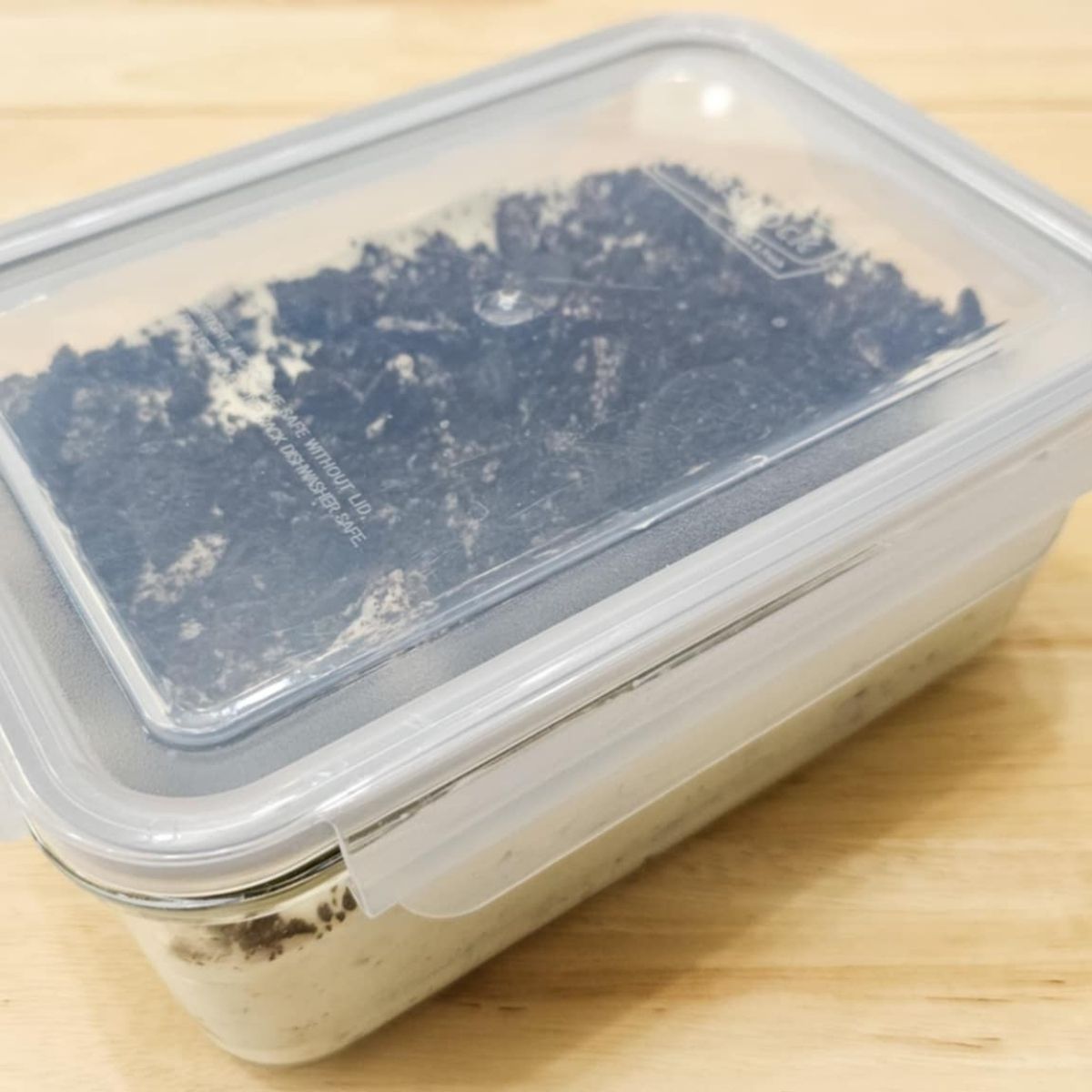 Freezer safe glass container with homemade ice cream in it