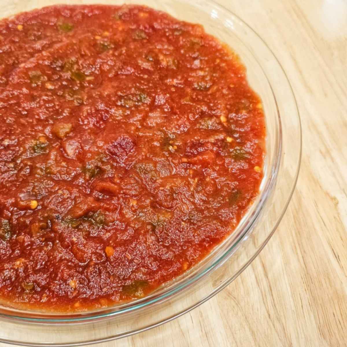 salsa spread out evenly over the cream cheese and sour cream mixture