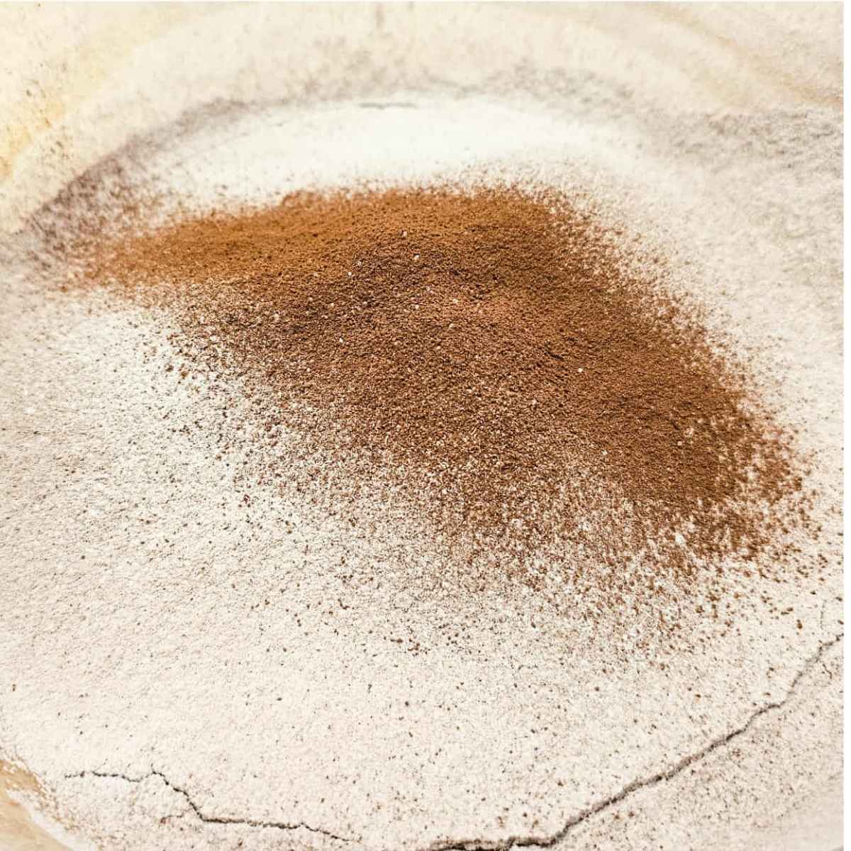 dry ingredients sifted over the wet in a glass bowl