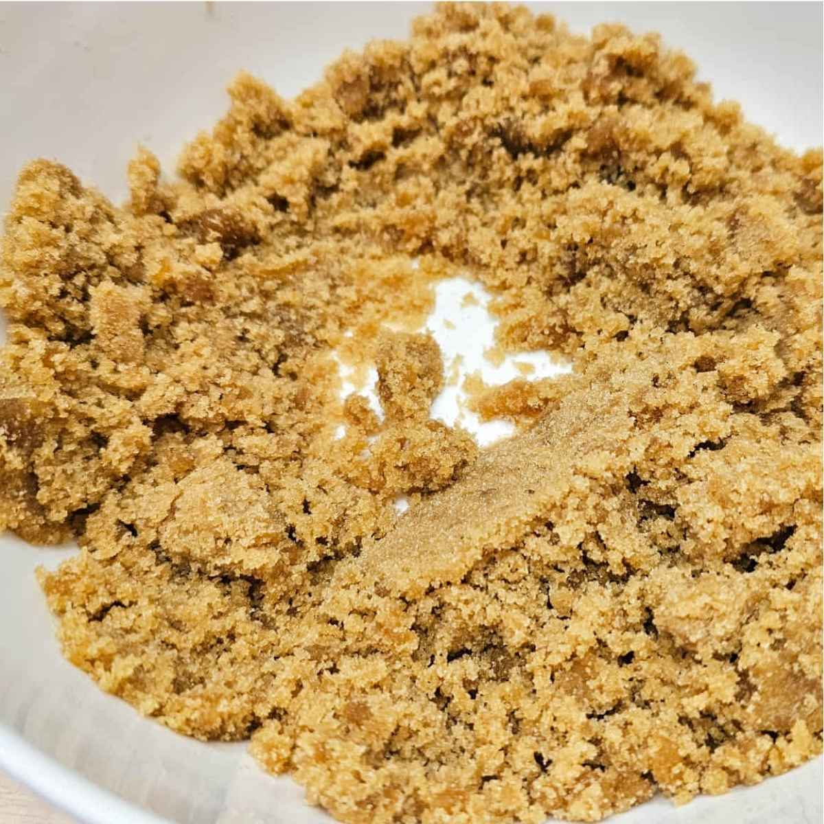 brown sugar and butter mixed in a white glass bowl