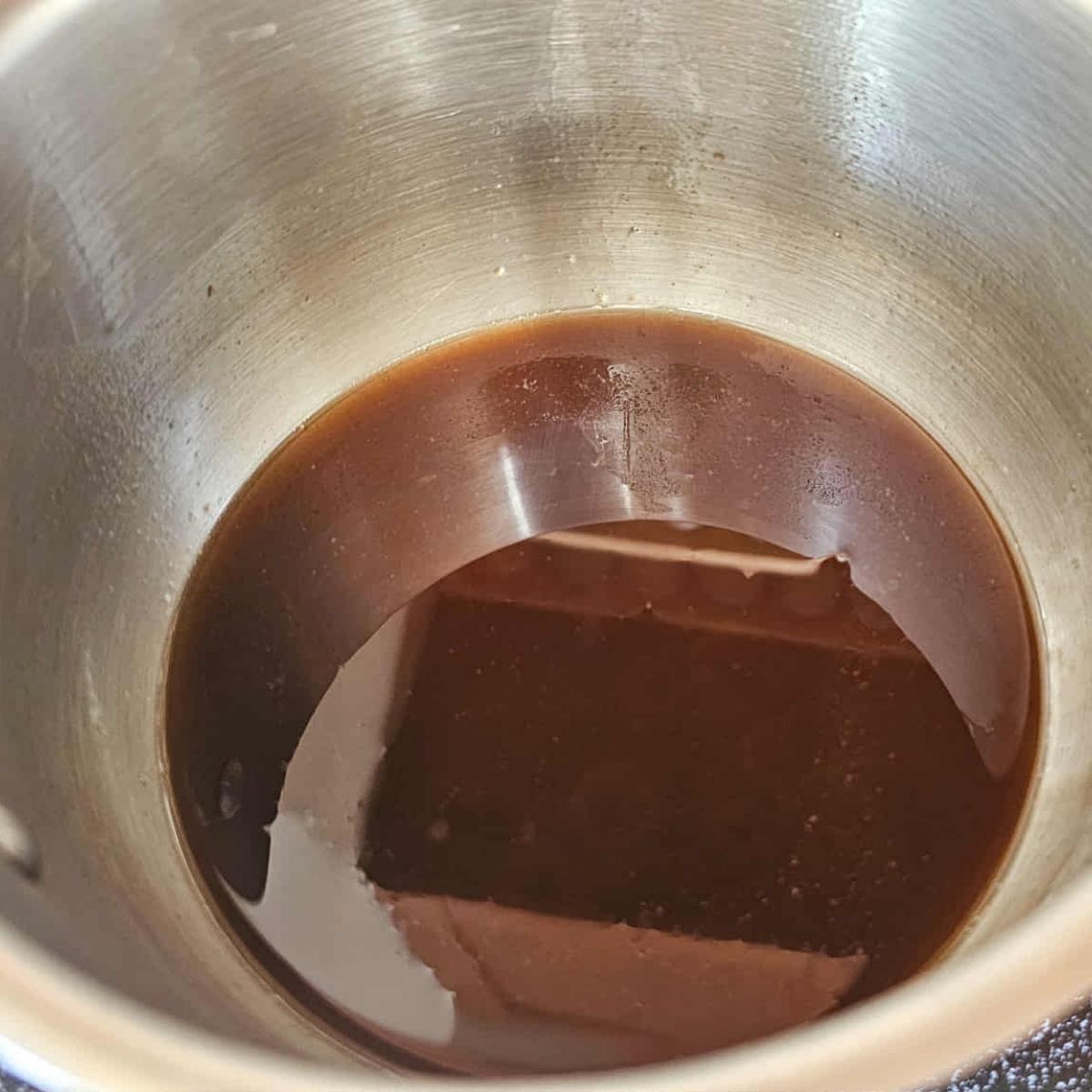 coconut oil, maple syrup, brown sugar, salt and cinnamon in a small stainless steel pot 